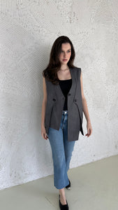 Stripped asymmetric vest