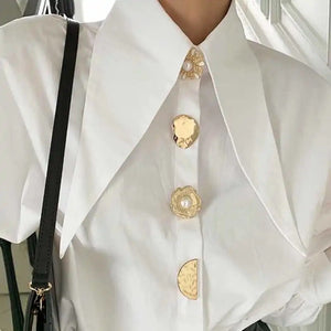 White shirt with button detail