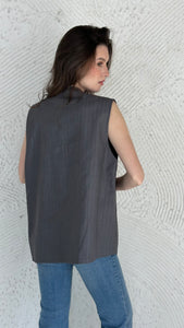 Stripped asymmetric vest