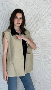 Light vest with leather collar