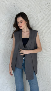 Stripped asymmetric vest